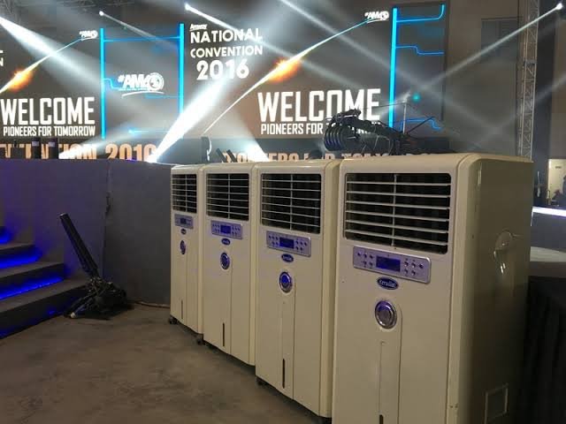 Outdoor event tent setup with multiple air cooling units and climate control infrastructure