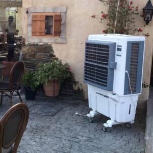 Professional floor-standing air cooler unit white with control panel in doorway