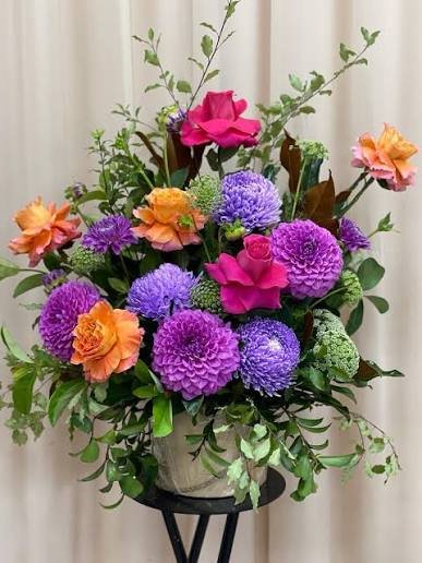 Boutique artificial flower display with peonies hydrangeas and greenery in terracotta pots for hotel lobby and venue styling rental