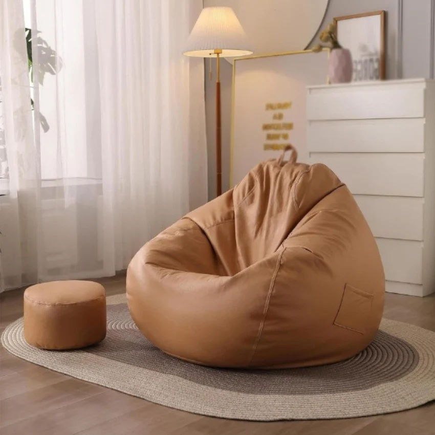 Blue and red bean bags with patterned cushions in bright room showing casual lounge seating arrangement