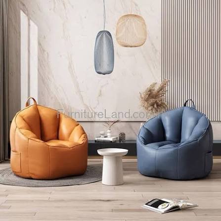 Beige comfortable bean bag lounge chair with ottoman creating relaxed sitting environment
