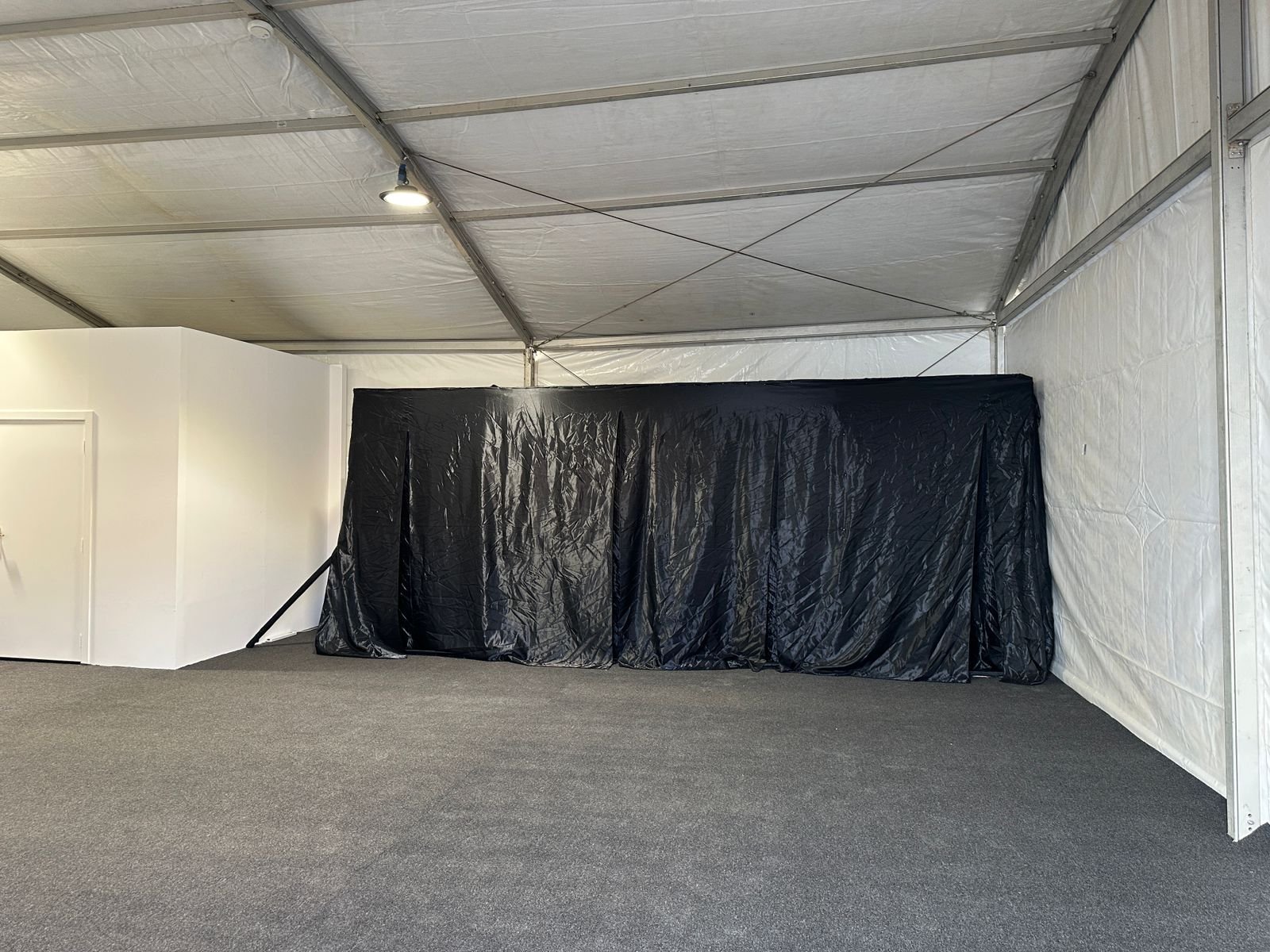 Elegant carpet flooring supporting complete event setup