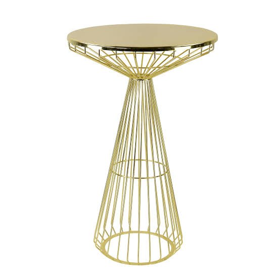 White cocktail table with flower centerpiece at modern venue