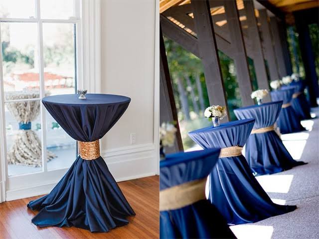 Gold pedestal cocktail table with sophisticated design