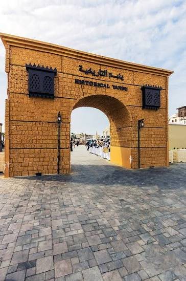 Heritage style stone entrance gateway in traditional Saudi architecture for cultural event and destination