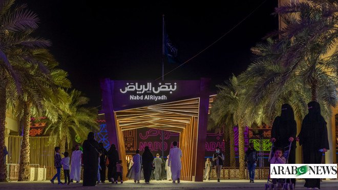 Immersive LED entrance tunnel with screens and light lines for branded exhibition experience Riyadh KSA