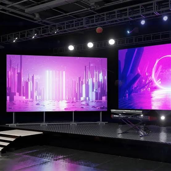 Large outdoor LED screen displaying vivid content on city billboard structure rental Saudi Arabia