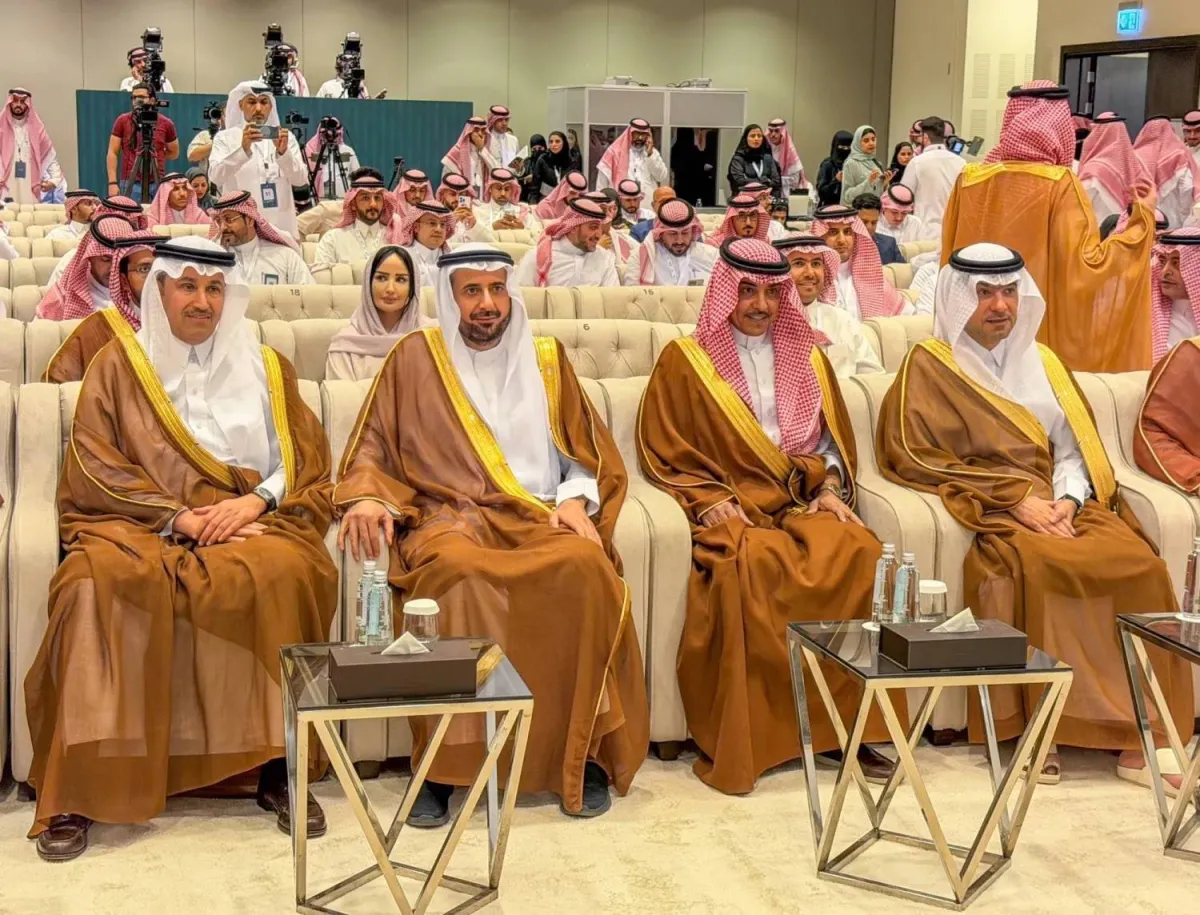 Saudi National Day public festival ground with stage LED screens branded towers benches and crowd seating setup rental