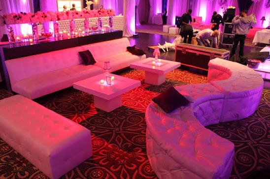 Large-scale product launch venue with lounge seating and branded elements