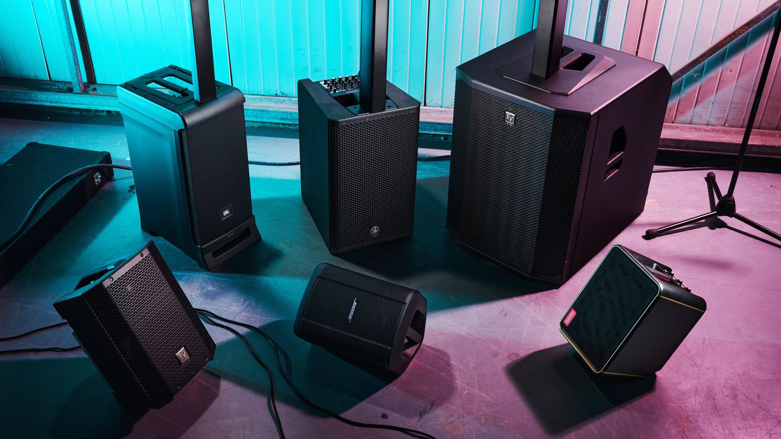 Line array speaker stacks on outdoor festival stage rental KSA