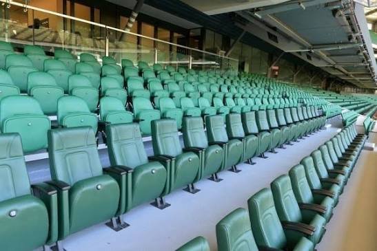 Red plastic tiered stadium seating rows for tournament venue rental Saudi Arabia