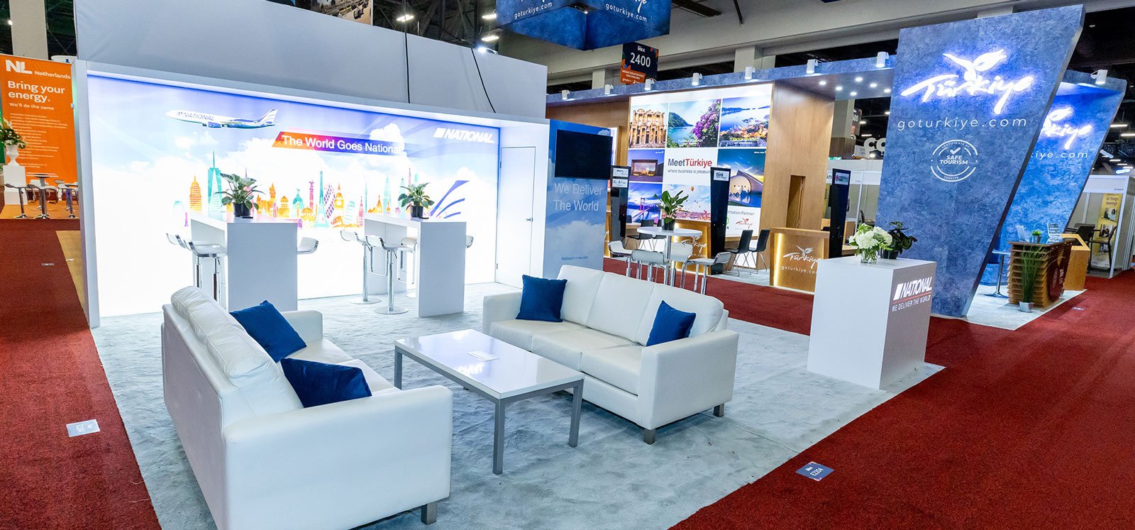 Large-scale product launch venue with lounge seating and branded elements